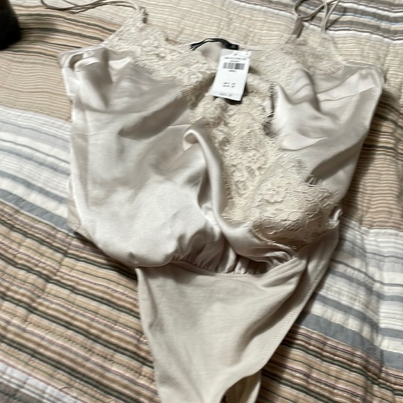 Abercrombie & Fitch Tops - Abercrombie &Fitch womens body suit New with tags never worn size Small. Cream